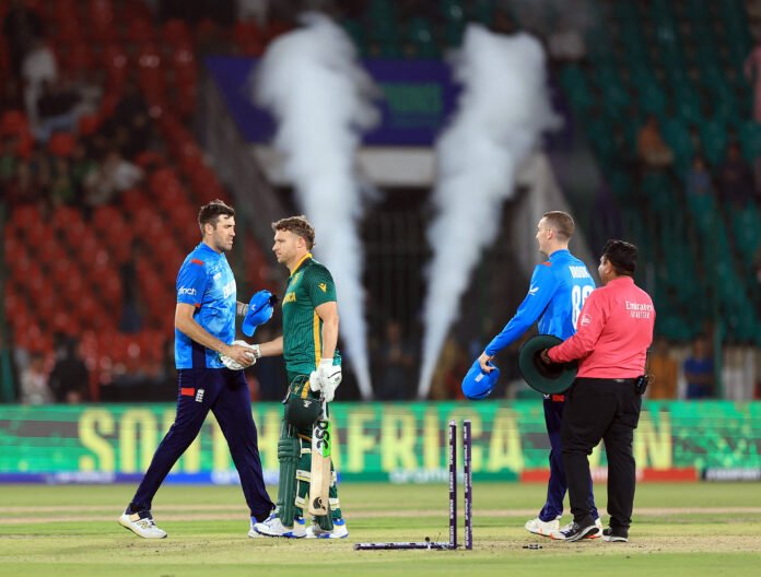 South Africa's David Miller exchanges a handshake with England's Jamie Overton