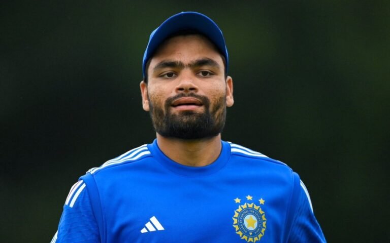 Rinku Singh in Team India training jersey.